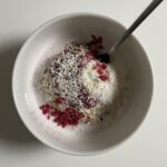 White Chocolate Overnight Oats with Raspberries and Frothed Milk